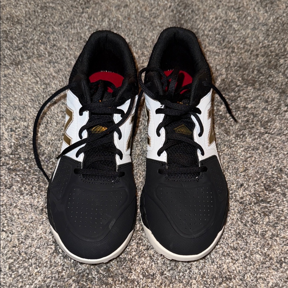 New Balance woman’s turf shoes